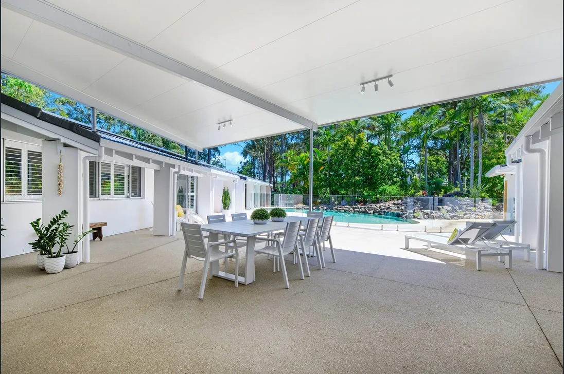 Covered concrete patio entertaining area