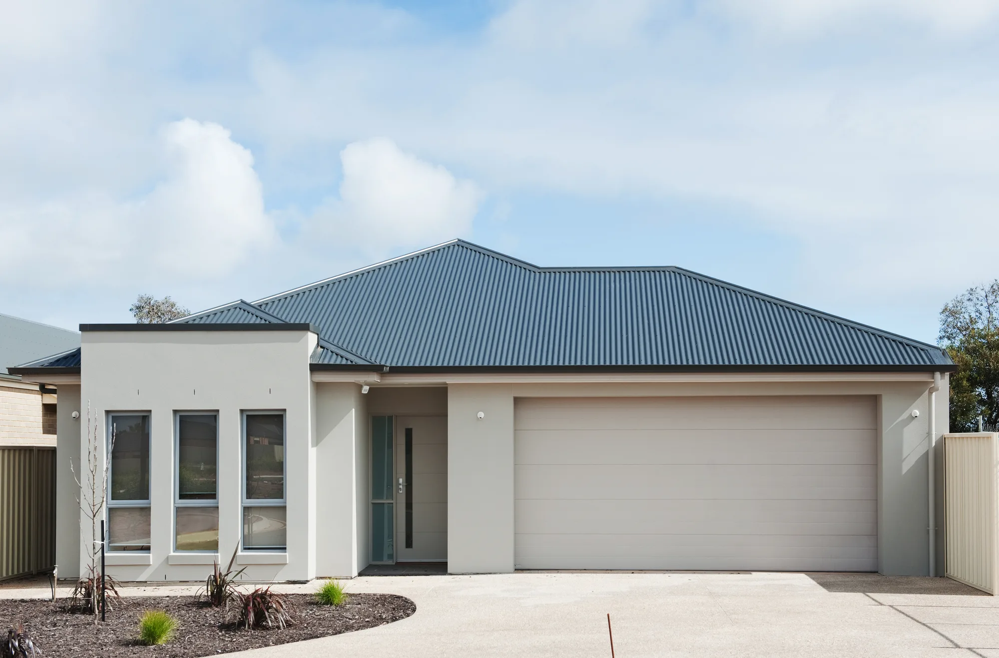 Plain concrete driveway finish on a Campbelltown home